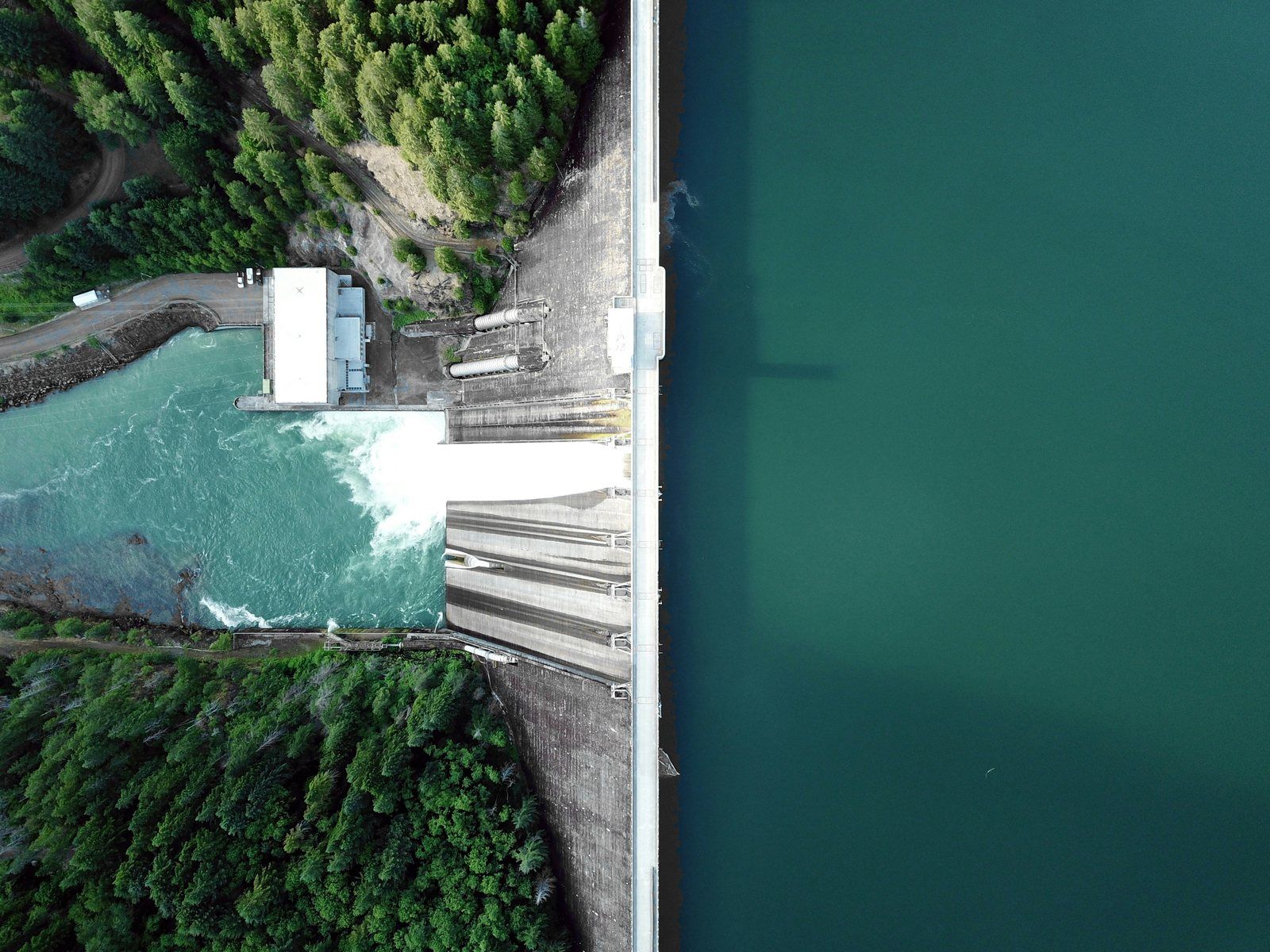 Aerial view of a hydroelectric dam and reservoir
